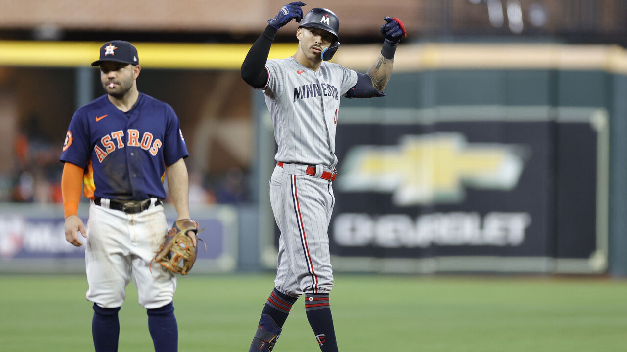 HOUSTON, TEXAS - OCTOBER 08: Carlos Correa #4 of the Minnesota Twins celebrates his double against the Houston Astros during the seventh inning in Game Two of the Division Series at Minute Maid Park on October 08, 2023 in Houston, Texas.