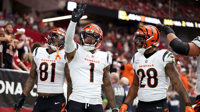 GLENDALE, ARIZONA - OCTOBER 08: Ja'Marr Chase #1 of the Cincinnati Bengals celebrates a touchdown with teammates Joe Mixon #28 and Irv Smith Jr. #81 against the Arizona Cardinals during the first quarter at State Farm Stadium on October 08, 2023 in Glendale, Arizona.