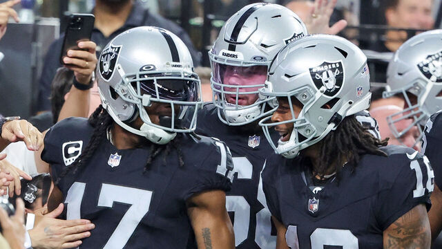 LAS VEGAS, NEVADA - SEPTEMBER 24: Wide receiver Davante Adams #17, center Andre James #68 and wide receiver Jakobi Meyers #16 of the Las Vegas Raiders celebrate Adams' touchdown against the Pittsburgh Steelers in the first quarter of their game at Allegiant Stadium on September 24, 2023 in Las Vegas, Nevada. The Steelers defeated the Raiders 23-18.