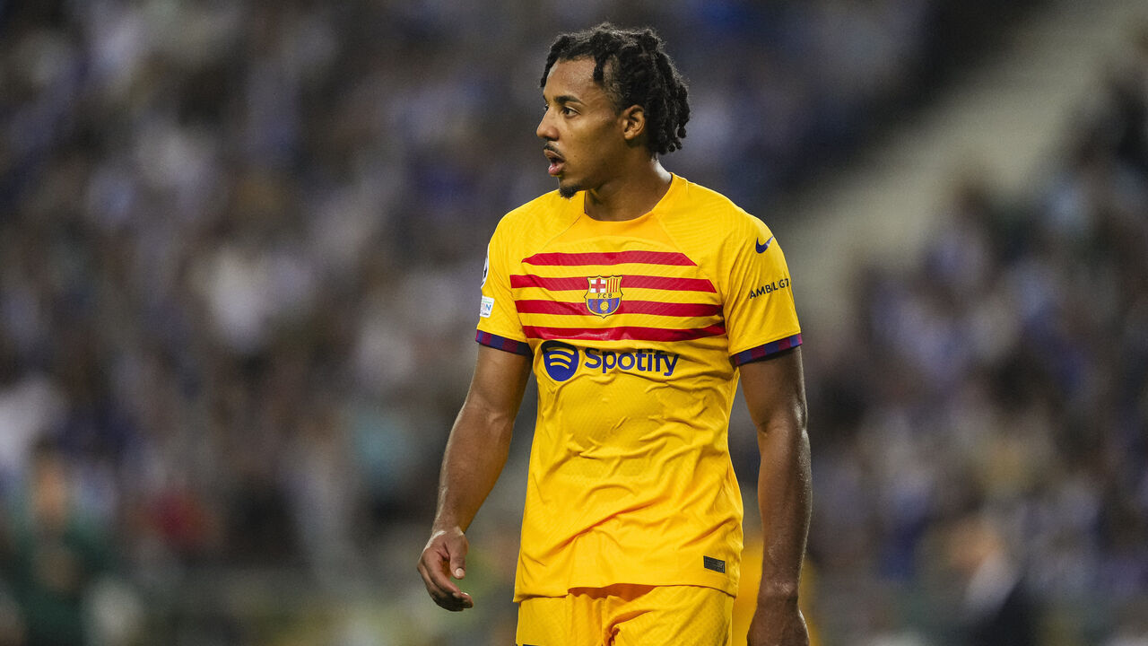 PORTO, PORTUGAL - OCTOBER 4: Jules Koundé of Barcelona walks in the field during the UEFA Champions League Group Stage Group H match between FC Porto and FC Barcelona at Estadio do Dragao on October 4, 2023 in Porto, Portugal.