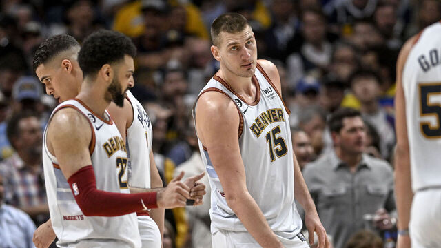 DENVER, CO - JUNE 12: Nikola Jokic (15) of the Denver Nuggets and Jamal Murray (27) speak on the court in the fourth quarter during the Nuggets' 94-89 NBA Finals clinching win over the Miami Heat at Ball Arena in Denver on Monday, June 12, 2023.