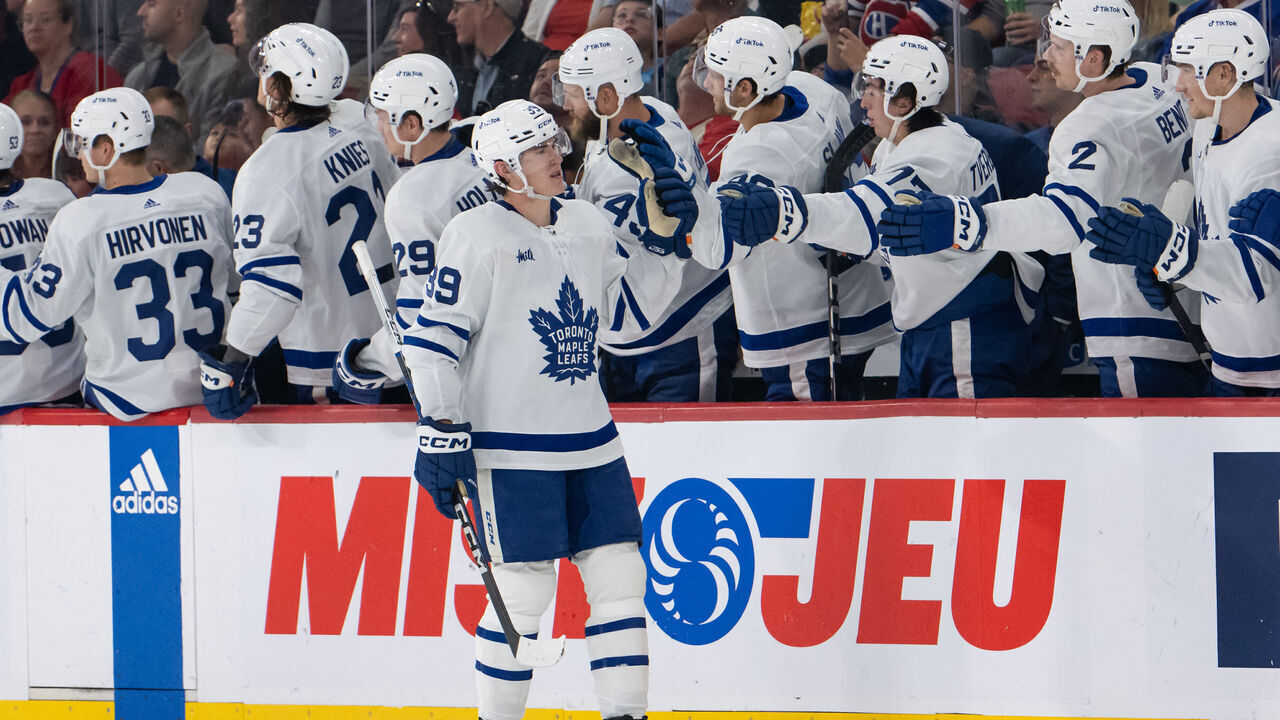 MONTREAL, QC - SEPTEMBER 30: Fraser Minten (39) of the Toronto Maple Leafs celebrates with teammates after scoring a goal during the second period of the NHL pre-season game between the Toronto Maple Leafs and the Montreal Canadiens on September 30, 2023, at the Bell Centre in Montreal, QC