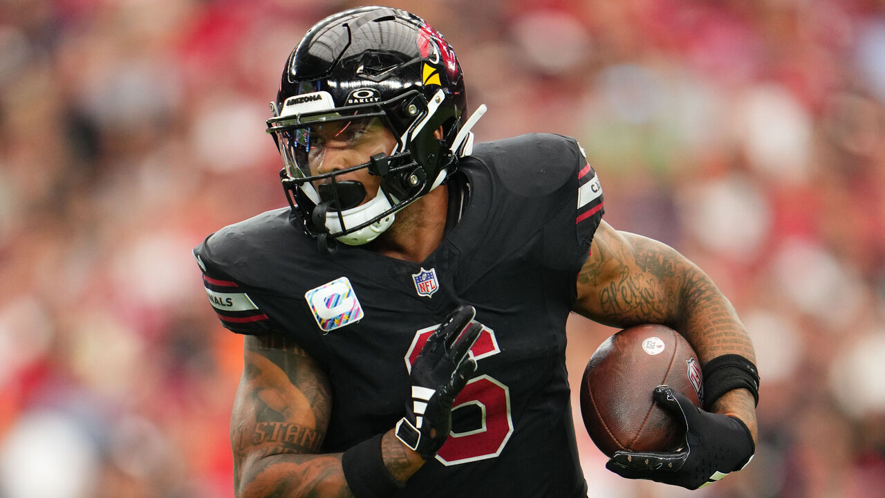 GLENDALE, AZ - OCTOBER 08: James Conner #6 of the Arizona Cardinals carries the ball against the Cincinnati Bengals during the first half at State Farm Stadium on October 8, 2023 in Glendale, Arizona.