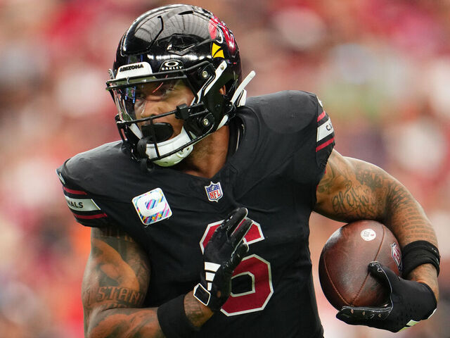 GLENDALE, AZ - OCTOBER 08: James Conner #6 of the Arizona Cardinals carries the ball against the Cincinnati Bengals during the first half at State Farm Stadium on October 8, 2023 in Glendale, Arizona.