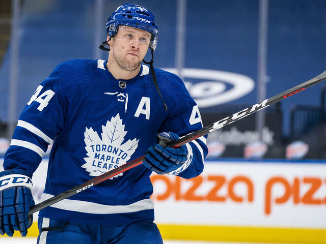 TORONTO, ON - MARCH 29: with pride tape on his stick, Morgan Rielly #44 of the Toronto Maple Leafs warms up before facing the Edmonton Oilers at the Scotiabank Arena on March 29, 2021 in Toronto, Ontario, Canada.