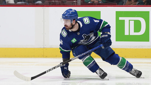 VANCOUVER, CANADA - APRIL 4: Conor Garland #8 of the Vancouver Canucks skates up ice during their NHL game against the Seattle Kraken at Rogers Arena April 4, 2023 in Vancouver, British Columbia, Canada.