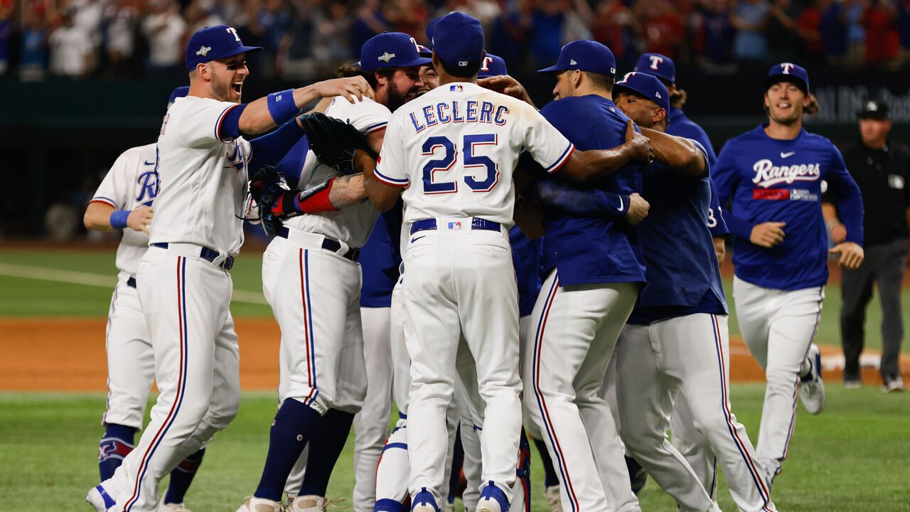 ARLINGTON, TX - OCTOBER 10: Members of the Texas Rangers celebrate their win over the Baltimore Orioles in Game 3 of the Division Series at Globe Life Field on Tuesday, October 10, 2023 in Arlington, Texas. The Rangers defeated the Orioles 7-1 to advance to the American League Championship Series.