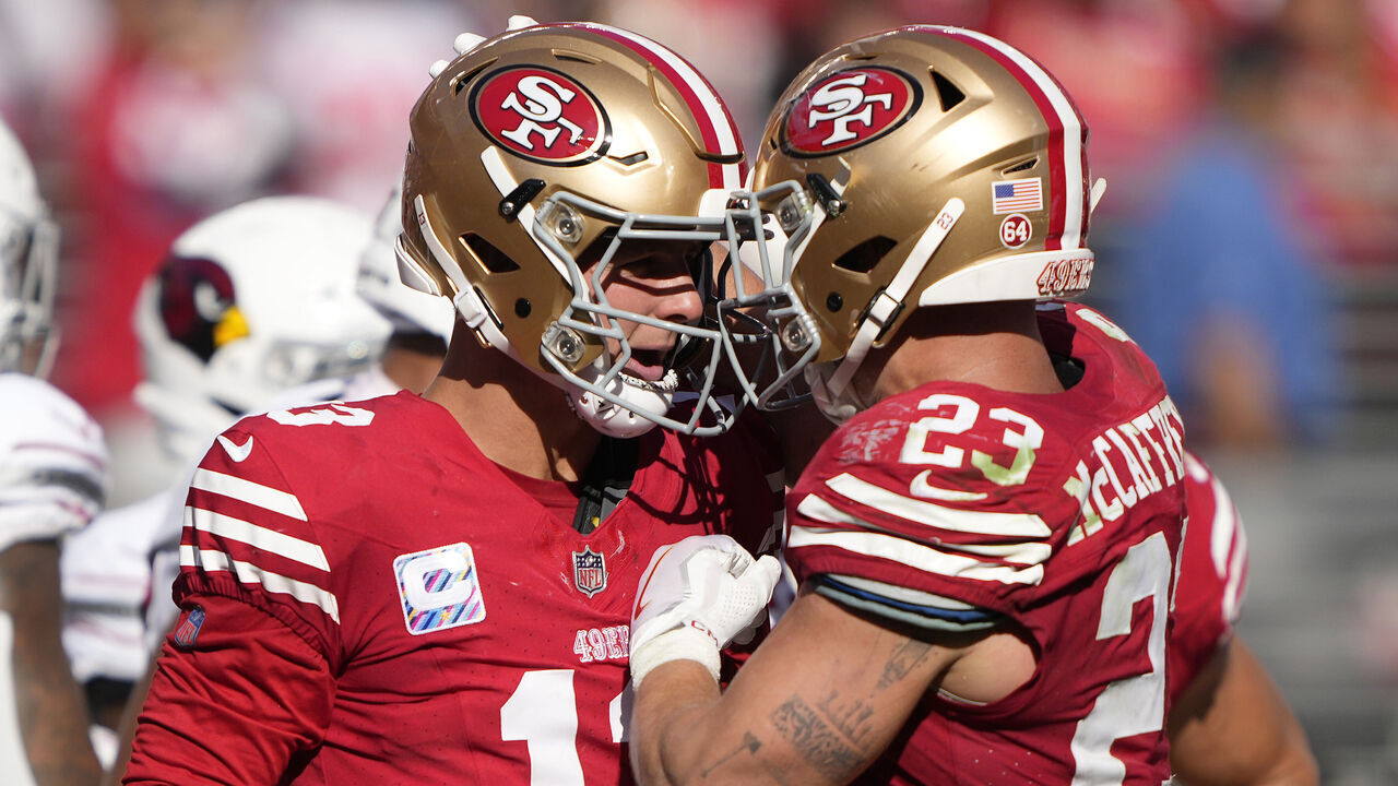 SANTA CLARA, CALIFORNIA - OCTOBER 01: Brock Purdy #13 of the San Francisco 49ers celebrates his rushing touchdown with Christian McCaffrey #23 during the fourth quarter against the Arizona Cardinals at Levi's Stadium on October 01, 2023 in Santa Clara, California.