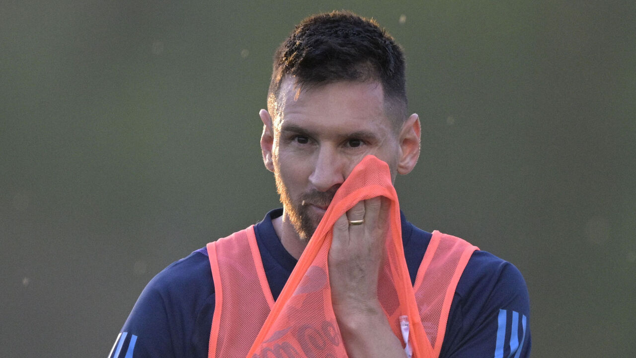 Argentina's forward Lionel Messi wipes his sweat during a training session in Ezeiza, Buenos Aires, on October 10, 2023, ahead of FIFA World Cup 2026 qualifier football matches against Paraguay and Peru.