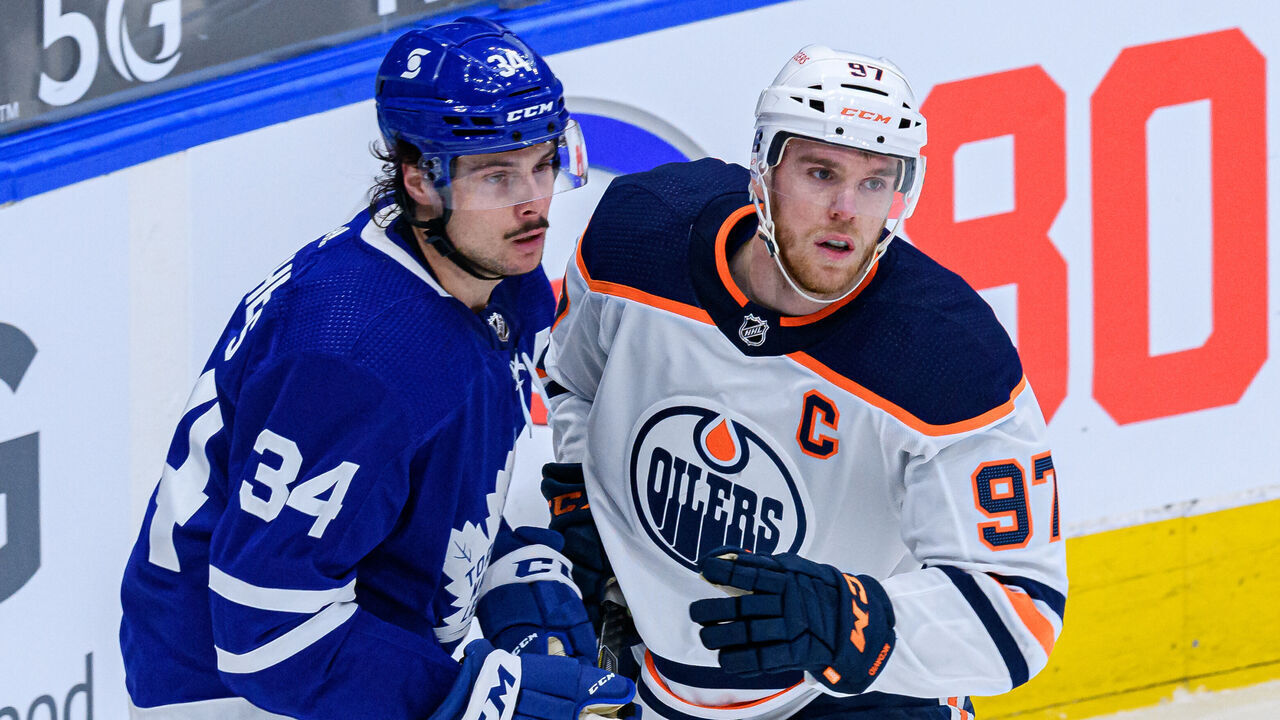 TORONTO, ON - MARCH 29: Toronto Maple Leafs Center Auston Matthews (34) and Edmonton Oilers Center Connor McDavid (97) react during the second period of the NHL regular season game between the Edmonton Oilers and the Toronto Maple Leafs on March 29, 2021, at Scotiabank Arena in Toronto, ON, Canada.