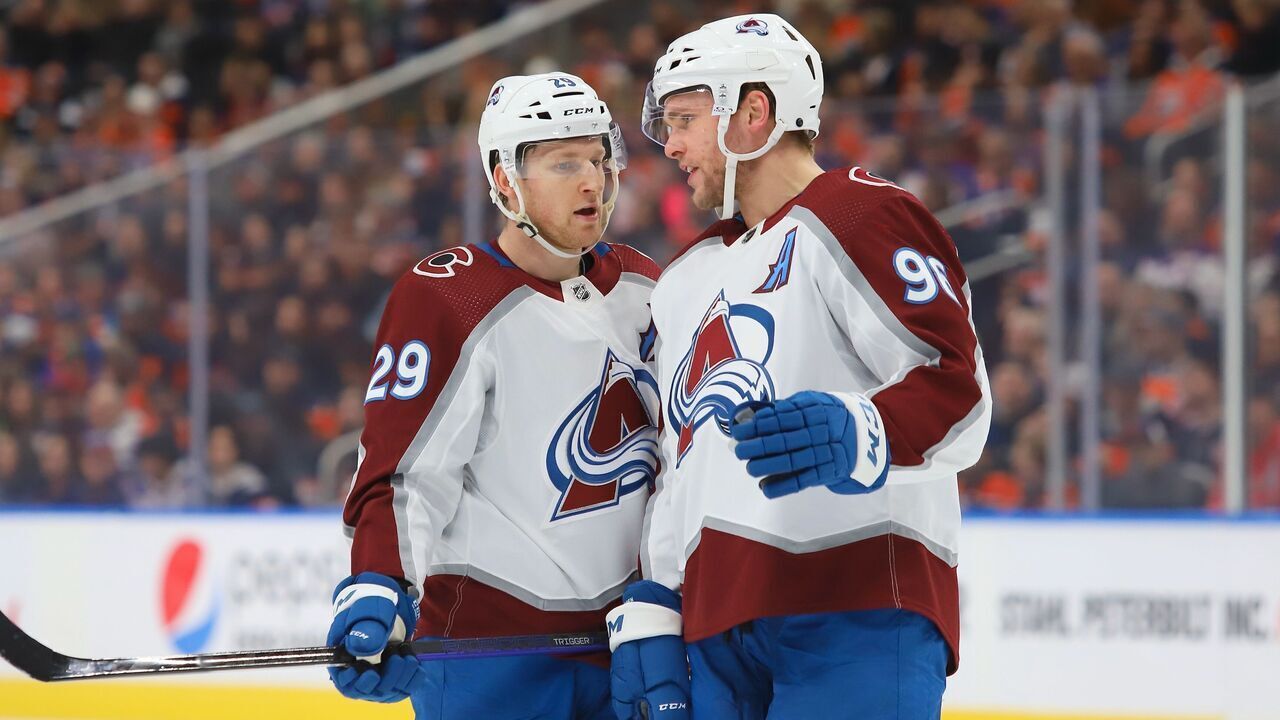 EDMONTON, CANADA - JANUARY 7: Nathan Mackinnon #29 of the Colorado Avalanche discuss face off strategy with Mikko Rantanen #96 in the first period against the Edmonton Oilers on January 7, 2023 at Rogers Place in Edmonton, Alberta, Canada.