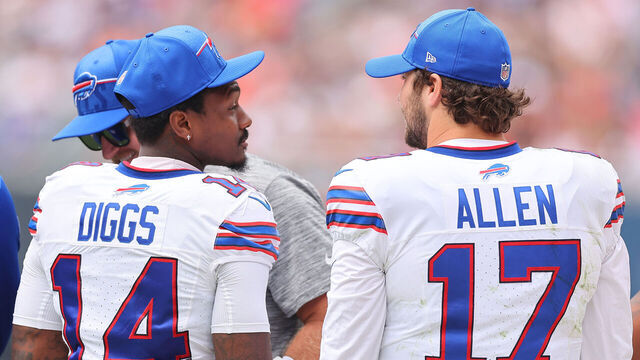 CHICAGO, ILLINOIS - AUGUST 26: Stefon Diggs #14 and Josh Allen #17 of the Buffalo Bills talk on the sideline during the second half of a preseason game against the Chicago Bears at Soldier Field on August 26, 2023 in Chicago, Illinois.
