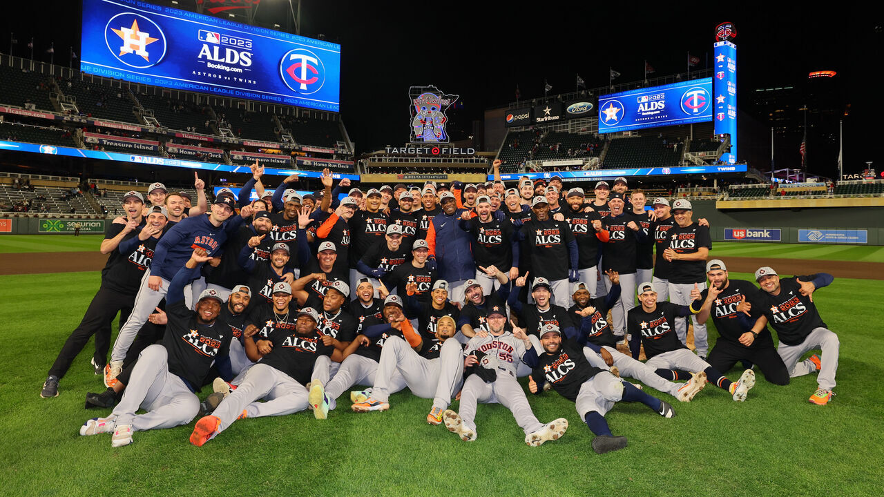 MINNEAPOLIS, MINNESOTA - OCTOBER 11: Houston Astros players pose for a photo after defeating the Minnesota Twins in Game Four of the Division Series at Target Field on October 11, 2023 in Minneapolis, Minnesota.