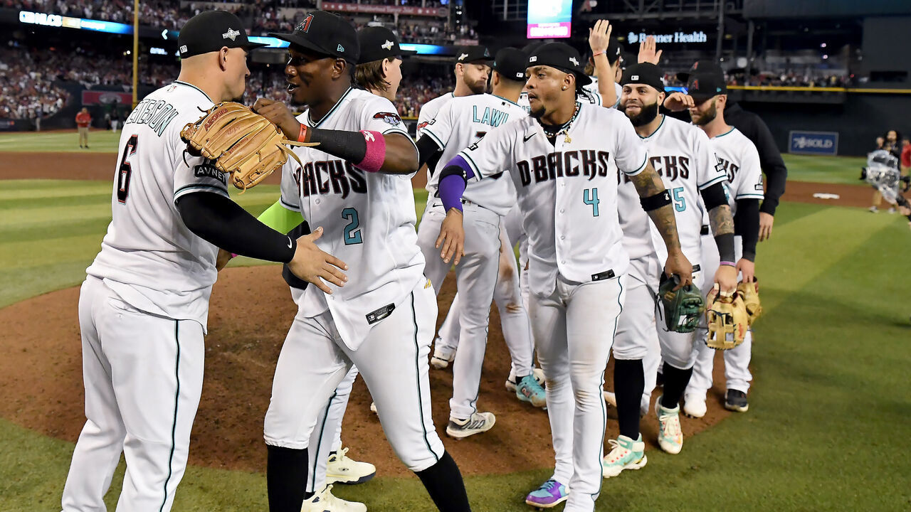 PHOENIX, ARIZONA - OCTOBER 11: The Arizona Diamondbacks celebrate after beating the Los Angeles Dodgers 4-2 in Game Three of the Division Series at Chase Field on October 11, 2023 in Phoenix, Arizona.