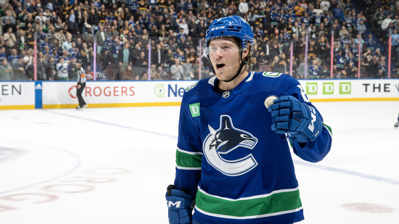 VANCOUVER, CANADA - OCTOBER 11: Brock Boeser #6 of the Vancouver Canucks heads to the bench to celebrate his goal during the first period of their NHL game against the the Edmonton Oilers at Rogers Arena October 11, 2023 in Vancouver, British Columbia, Canada.