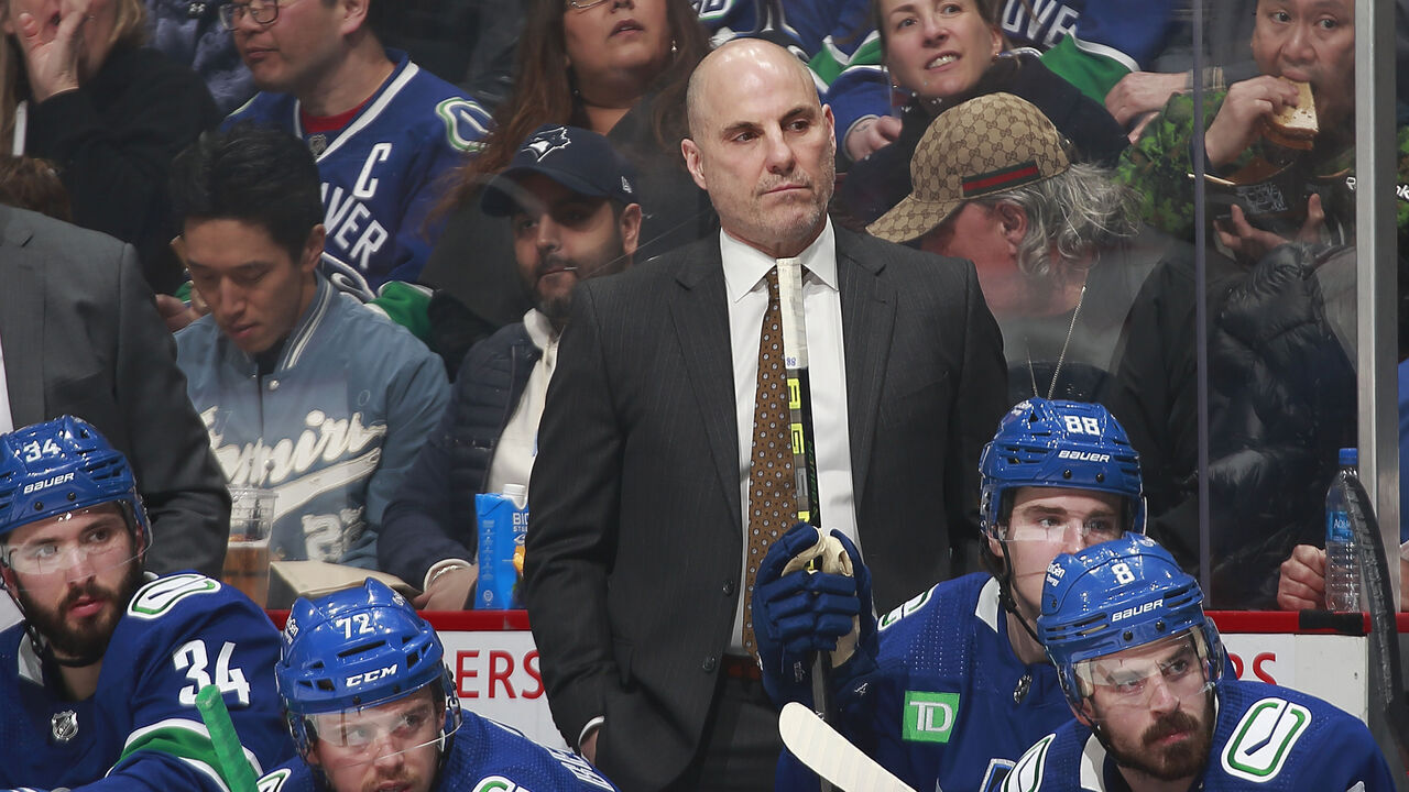 VANCOUVER, CANADA - APRIL 4: Head coach Rick Tocchet of the Vancouver Canucks looks on from the bench during their NHL game against the Seattle Kraken at Rogers Arena April 4, 2023 in Vancouver, British Columbia, Canada.