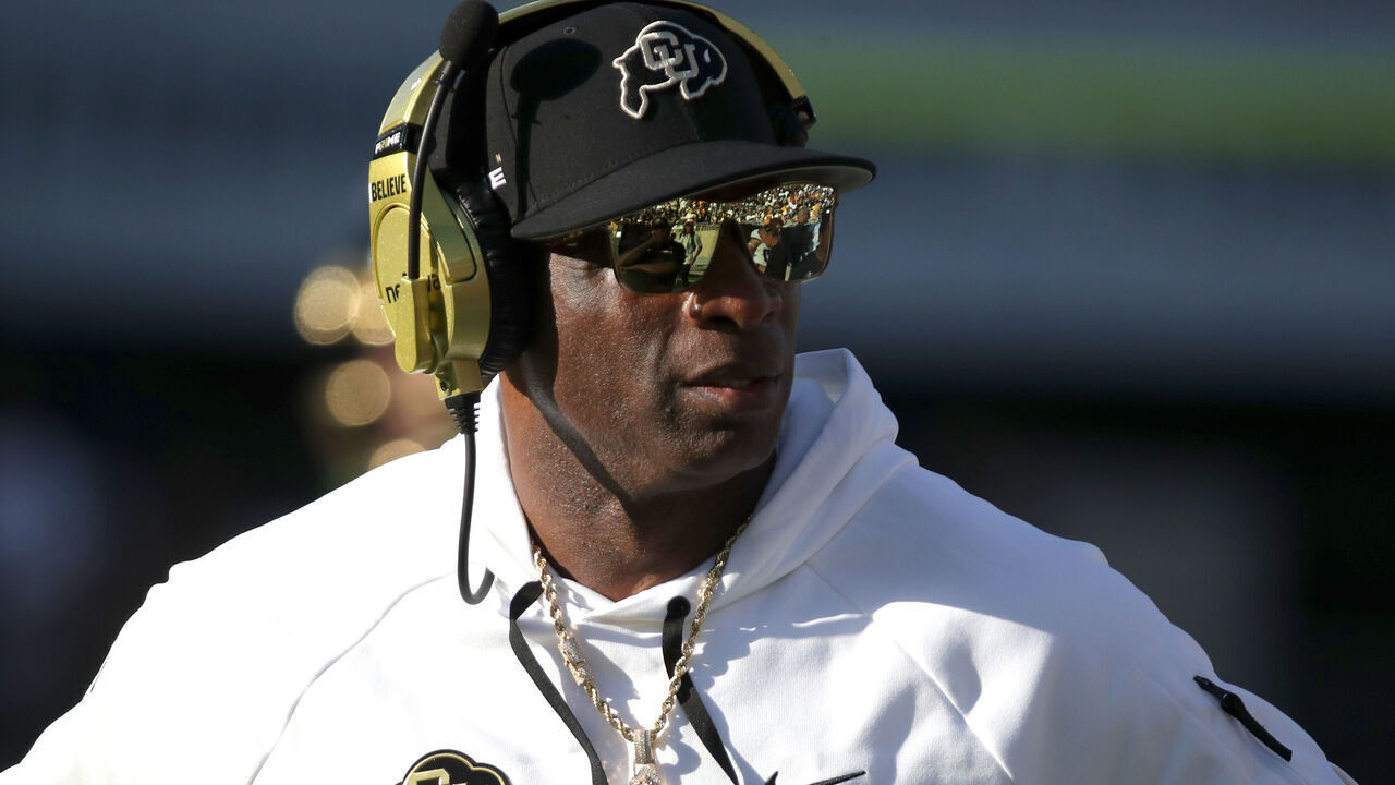 TEMPE, ARIZONA - OCTOBER 7: Head Coach Deion Sanders of the University of Colorado Buffs watches his team from the sidelines during the University of Colorado Buffs versus the Arizona State Sun Devils football game at Mountain America Stadium on October 7, 2023 in Tempe, Arizona.