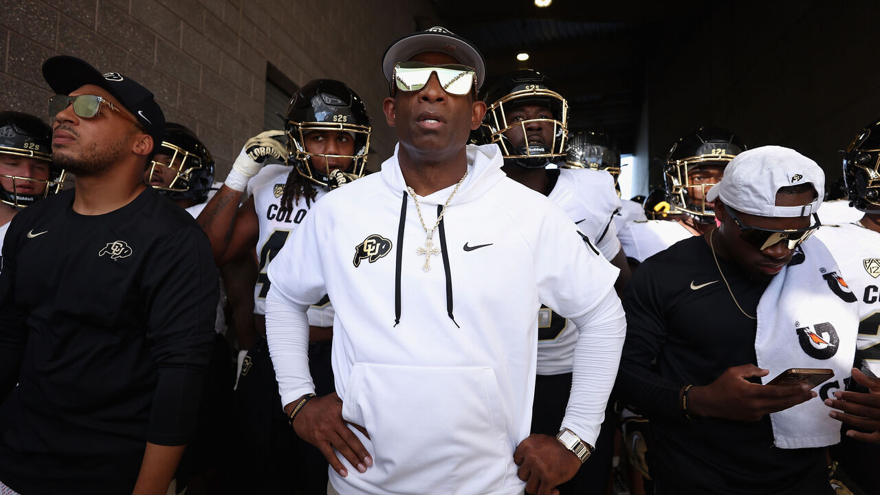 TEMPE, ARIZONA - OCTOBER 07: Head coach Deion Sanders of the Colorado Buffaloes prepares to take the field with teammates for the NCAAF game against the Arizona State Sun Devils at Mountain America Stadium on October 07, 2023 in Tempe, Arizona. The Buffaloes defeated the Sun Devils 27-24.