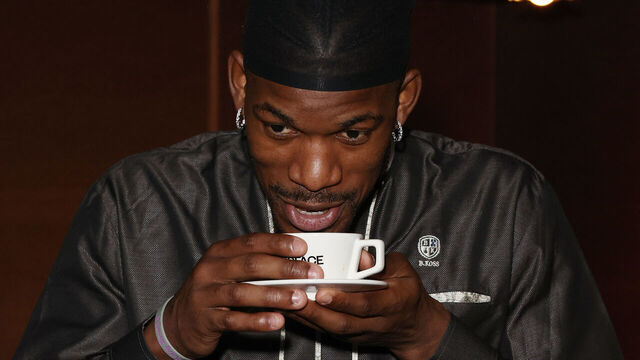 MIAMI, FLORIDA - FEBRUARY 9: Miami Heat basketball player Jimmy Butler drinks Big Face Coffee at the Haute Living magazine Jimmy Butler celebration at El Tucan on February 9, 2023 in Miami, Florida.