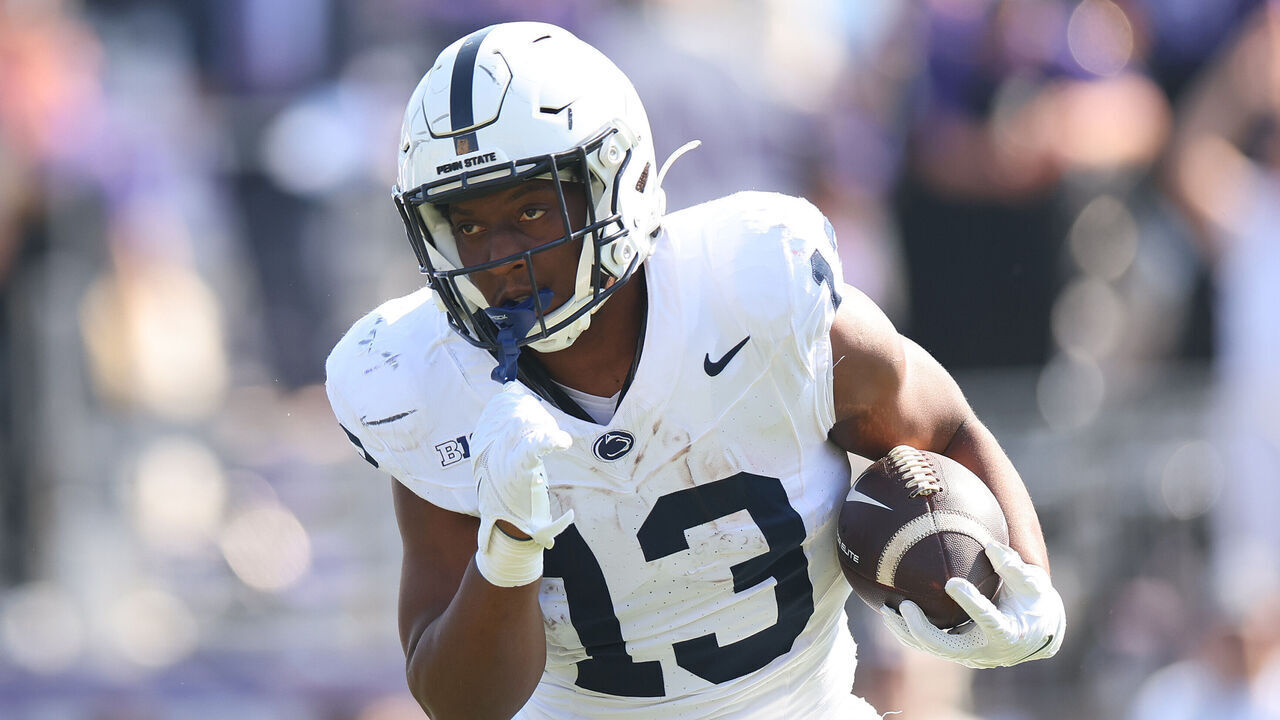EVANSTON, ILLINOIS - SEPTEMBER 30: Kaytron Allen #13 of the Penn State Nittany Lions runs with the ball against the Northwestern Wildcats during the first half at Ryan Field on September 30, 2023 in Evanston, Illinois.