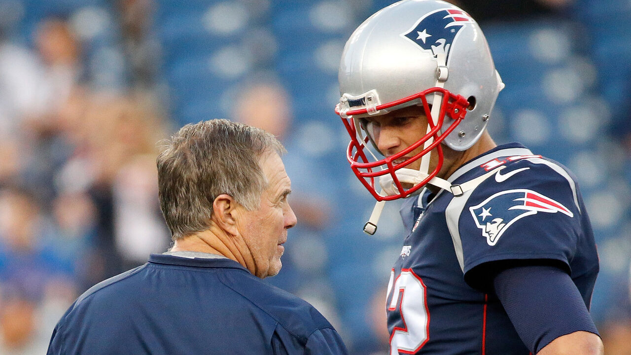FOXBORO, MA - AUGUST 31: Bill Belichick of the New England Patriots and Tom Brady #12 chat before a preseason game with the New York Giants at Gillette Stadium on August 31, 2017 in Foxboro, Massachusetts.