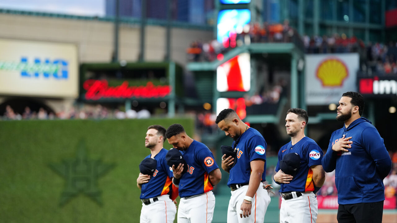 HOUSTON, TX - OCTOBER 08: Members of the Houston Astros stand for the national anthem prior to Game 2 of the Division Series between the Minnesota Twins and the Houston Astros at Minute Maid Park on Sunday, October 8, 2023 in Houston, Texas.