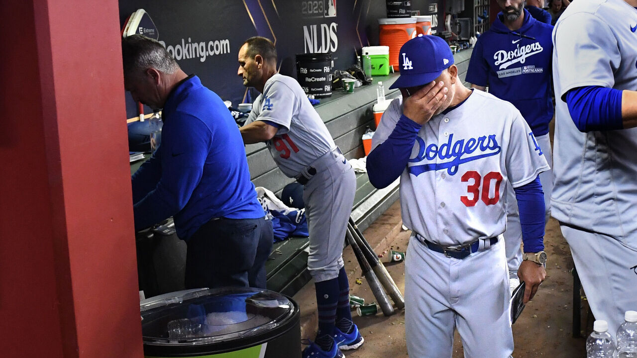 PHOENIX, AZ - October 11: Los Angeles Dodgers manager Dave Roberts reacts to loosing the National League Division Series to the Arizona Diamondbacks in a three game sweep at Chase Field on Monday, Oct. 11, 2023, in Phoenix, AZ. (Wally Skalij / Los Angeles Times via Getty Images)