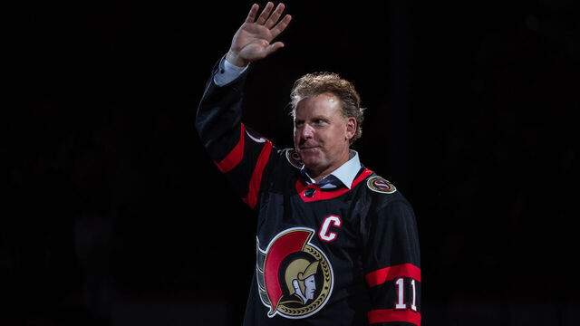 OTTAWA, ON - OCTOBER 18: Former Ottawa Senators player Daniel Alfredsson waves to the crowd prior to a ceremonial face-off before National Hockey League action between the Boston Bruins and Ottawa Senators on October 18, 2022, at Canadian Tire Centre in Ottawa, ON, Canada.