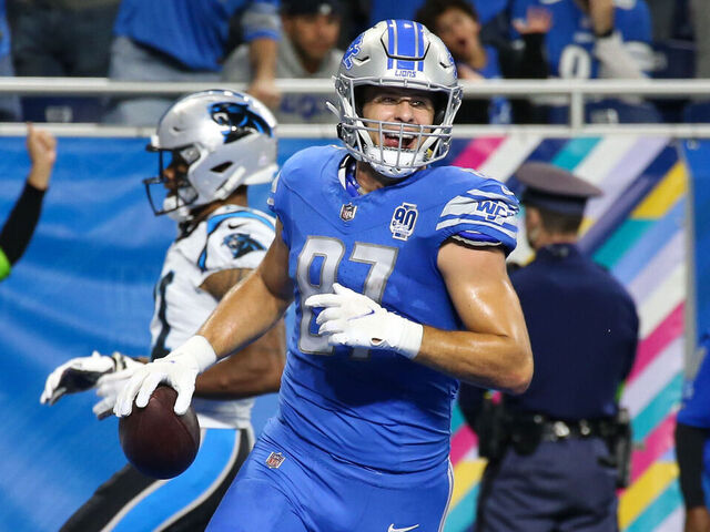 DETROIT, MI - OCTOBER 08: Detroit Lions tight end Sam LaPorta (87) celebrates as he runs into the end zone for a touchdown after catching a pass during the second quarter of an NFL football game between the Carolina Panthers and the Detroit Lions on October 8, 2023 at Ford Field in Detroit, Michigan.