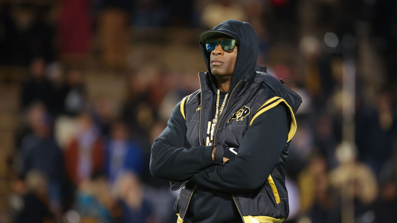 BOULDER, COLORADO - OCTOBER 13: Head coach Deion Sanders of the Colorado Buffaloes watches his team during warm-ups before taking on the Stanford Cardinal at Folsom Field on October 13, 2023 in Boulder, Colorado.