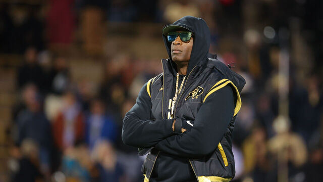 BOULDER, COLORADO - OCTOBER 13: Head coach Deion Sanders of the Colorado Buffaloes watches his team during warm-ups before taking on the Stanford Cardinal at Folsom Field on October 13, 2023 in Boulder, Colorado.