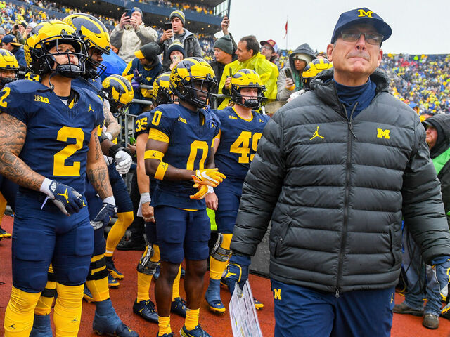 ANN ARBOR, MICHIGAN - OCTOBER 14: Head Coach Jim Harbaugh of the Michigan Wolverines prepares to lead his team onto the field before a game between the Michigan Wolverines and the Indiana Hoosiers at Michigan Stadium on October 14, 2023 in Ann Arbor, Michigan.