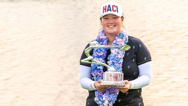 USA's Angel Yin celebrates with her trophy after winning the Shanghai LPGA golf tournament in Shanghai on Ocotber 15, 2023.