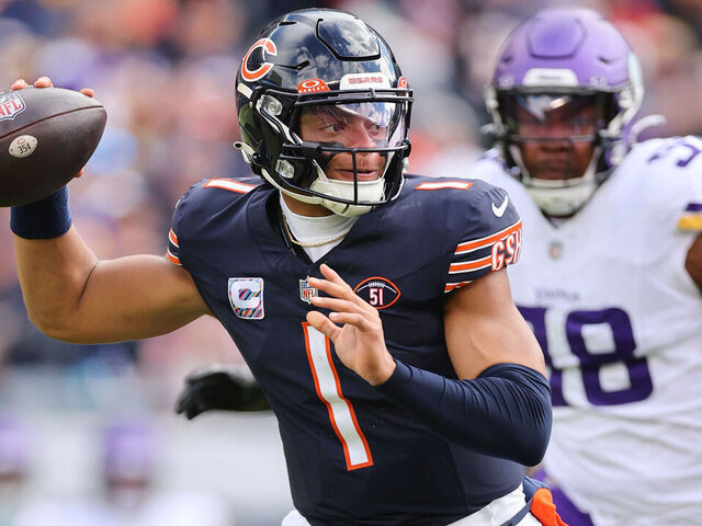 CHICAGO, ILLINOIS - OCTOBER 15: Justin Fields #1 of the Chicago Bears looks to pass in the game agains the Minnesota Vikings during the first quarter at Soldier Field on October 15, 2023 in Chicago, Illinois.