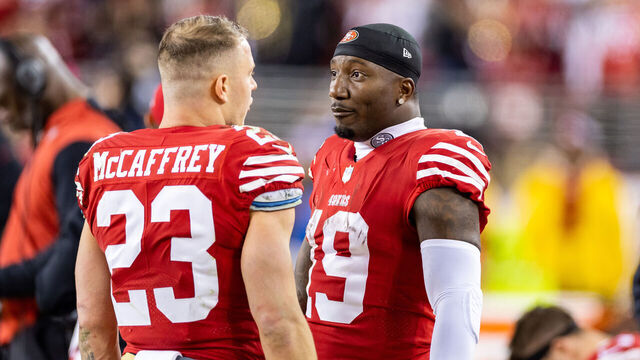 SANTA CLARA, CA - JANUARY 22: San Francisco 49ers wide receiver Deebo Samuel (19) talks to San Francisco 49ers running back Christian McCaffrey (23) on the sidelines during the NFL NFC Divisional Playoff game between the Dallas Cowboys and San Francisco 49ers at Levis Stadium in Santa Clara, CA.
