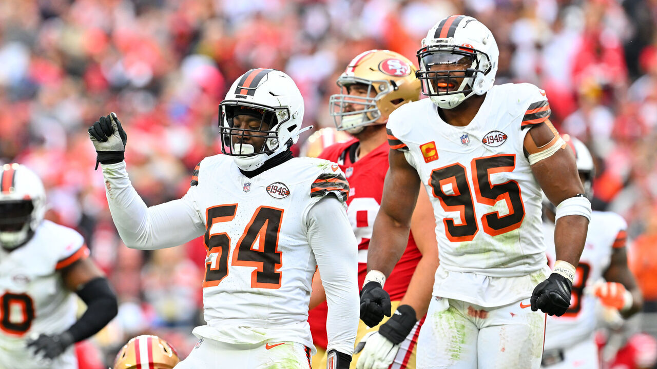 CLEVELAND, OHIO - OCTOBER 15: Ogbo Okoronkwo #54 of the Cleveland Browns and Myles Garrett #95 of the Cleveland Browns celebrate after a defensive play during the third quarter against the San Francisco 49ers at Cleveland Browns Stadium on October 15, 2023 in Cleveland, Ohio.