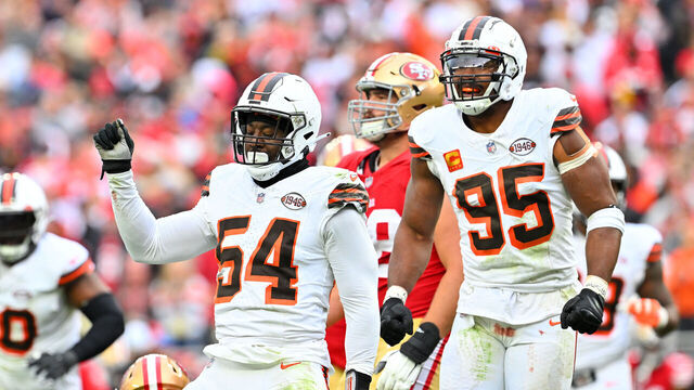 CLEVELAND, OHIO - OCTOBER 15: Ogbo Okoronkwo #54 of the Cleveland Browns and Myles Garrett #95 of the Cleveland Browns celebrate after a defensive play during the third quarter against the San Francisco 49ers at Cleveland Browns Stadium on October 15, 2023 in Cleveland, Ohio.