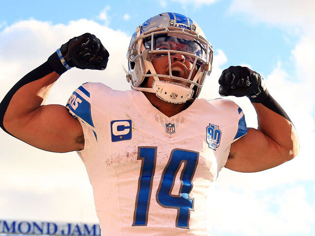 TAMPA, FLORIDA - OCTOBER 15: Amon-Ra St. Brown #14 of the Detroit Lions celebrates after a receiving touchdown during the second quarter against the Tampa Bay Buccaneers at Raymond James Stadium on October 15, 2023 in Tampa, Florida.