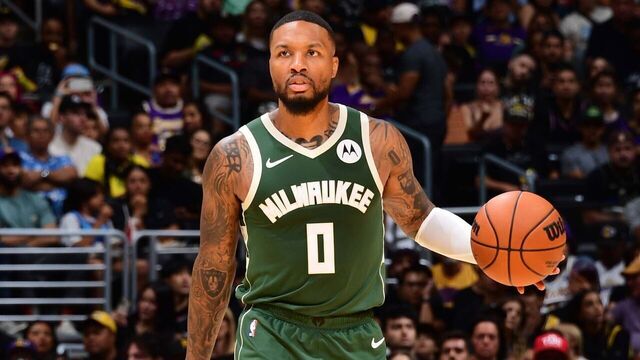 LOS ANGELES, CA - OCTOBER 15: Damian Lillard #0 of the Milwaukee Bucks dribbles the ball during the game against the Los Angeles Lakers on October 15, 2023 at Crypto.Com Arena in Los Angeles, California. NOTE TO USER: User expressly acknowledges and agrees that, by downloading and/or using this Photograph, user is consenting to the terms and conditions of the Getty Images License Agreement. Mandatory Copyright Notice: Copyright 2023 NBAE