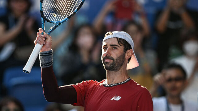 Jordan Thompson of Australia celebrates winning match point against Alexander Zverev of Germany in their men's singles match on the first day of the ATP Japan Open tennis tournament in Tokyo on October 16, 2023.