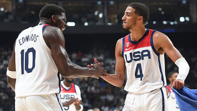ABU DHABI, UAE - AUGUST 20: Anthony Edwards #10 of the Senior Men's National Team & Tyrese Haliburton #4 of the Senior Men's National Team embrace during the game on August 20, 2023 in Abu Dhabi, The United Arab Emirates. NOTE TO USER: User expressly acknowledges and agrees that, by downloading and/or using this Photograph, user is consenting to the terms and conditions of the Getty Images License Agreement. Mandatory Copyright Notice: Copyright 2023 NBAE