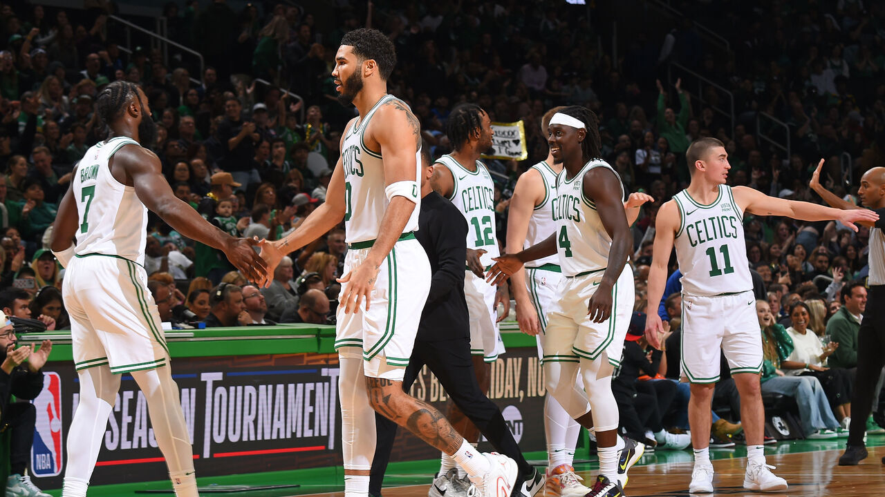 BOSTON, MA - OCTOBER 8: Jaylen Brown #7, Jayson Tatum #0 and Jrue Holiday #4 of the Boston Celtics celebrates against the Philadelphia 76ers on October 8, 2023 at the TD Garden in Boston, Massachusetts. Mandatory Copyright Notice: Copyright 2023 NBAE