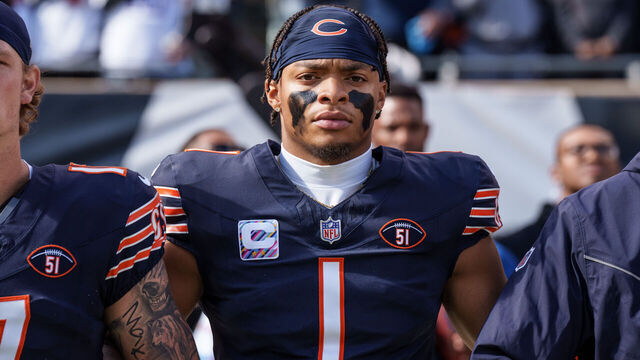 CHICAGO, IL - OCTOBER 15: Quarterback Justin Fields #1 of the Chicago bears stands for the national anthem prior to an NFL football game against the Minnesota Vikings at Soldier Field on October 15, 2023 in Chicago, Illinois.