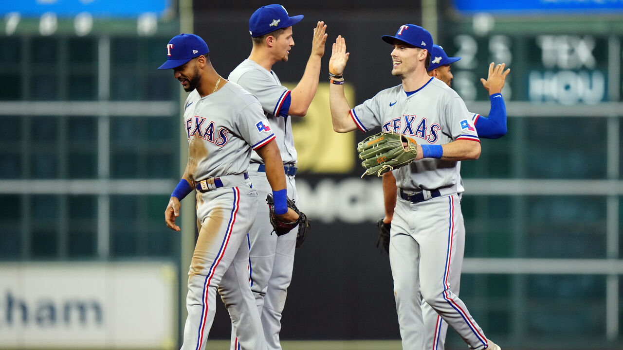 HOUSTON, TX - OCTOBER 16: Leody Taveras #3, Corey Seager #5, Evan Carter #32 and Marcus Semien #2 of the Texas Rangers celebrate after winning Game 2 of the ALCS between the Texas Rangers and the Houston Astros at Minute Maid Park on Monday, October 16, 2023 in Houston, Texas. The Rangers defeated the Astros 5-4.