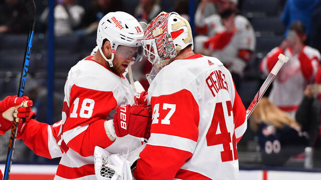 COLUMBUS, OHIO - OCTOBER 16: Goaltender James Reimer #47 of the Detroit Red Wings celebrates with teammate Andrew Copp #18 of the Detroit Red Wings after shutting out the Columbus Blue Jackets 4-0 in a game at Nationwide Arena on October 16, 2023 in Columbus, Ohio.