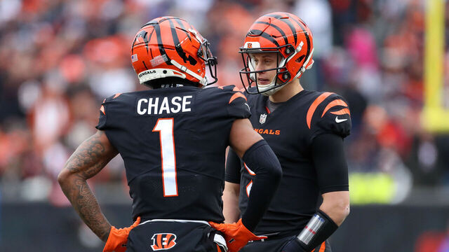 CINCINNATI, OH - JANUARY 08: Cincinnati Bengals wide receiver Ja'Marr Chase (1) talks to quarterback Joe Burrow (9) during a stop in play. In the game against the Baltimore Ravens and the Cincinnati Bengals on January 8, 2023, at Paycor Stadium in Cincinnati, OH.