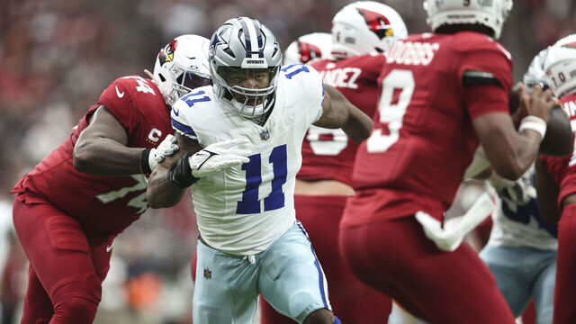 GLENDALE, ARIZONA - SEPTEMBER 24: Micah Parsons #11 of the Dallas Cowboys rushes Joshua Dobbs #9 of the Arizona Cardinals during an NFL football game between the Arizona Cardinals and the Dallas Cowboys at State Farm Stadium on September 24, 2023 in Glendale, Arizona.