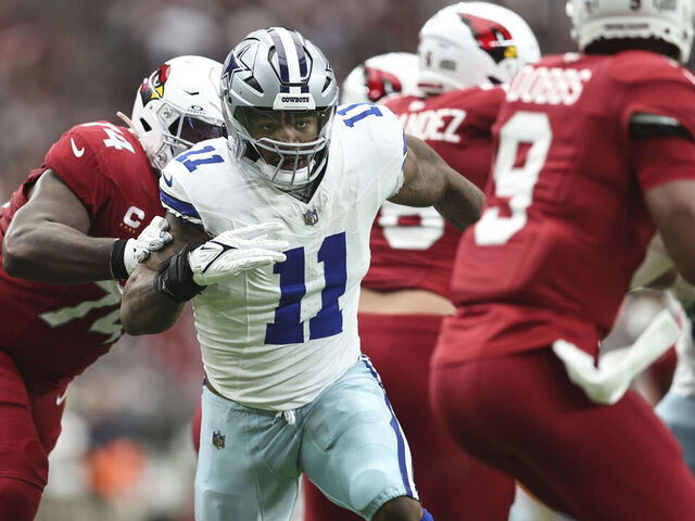 GLENDALE, ARIZONA - SEPTEMBER 24: Micah Parsons #11 of the Dallas Cowboys rushes Joshua Dobbs #9 of the Arizona Cardinals during an NFL football game between the Arizona Cardinals and the Dallas Cowboys at State Farm Stadium on September 24, 2023 in Glendale, Arizona.