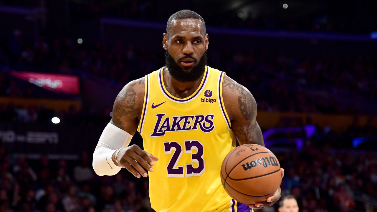 LOS ANGELES, CA - OCTOBER 13: LeBron James #23 of the Los Angeles Lakers dribbles the ball during the game against the Golden State Warriors on October 13, 2023 at Crypto.Com Arena in Los Angeles, California. NOTE TO USER: User expressly acknowledges and agrees that, by downloading and/or using this Photograph, user is consenting to the terms and conditions of the Getty Images License Agreement. Mandatory Copyright Notice: Copyright 2023 NBAE