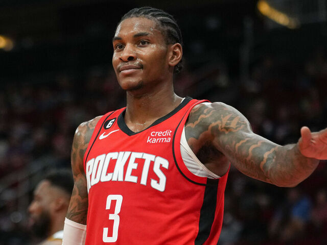 HOUSTON, TEXAS - APRIL 04: Kevin Porter Jr. #3 of the Houston Rockets reacts after a play during the game against the Denver Nuggets at Toyota Center on April 04, 2023 in Houston, Texas.